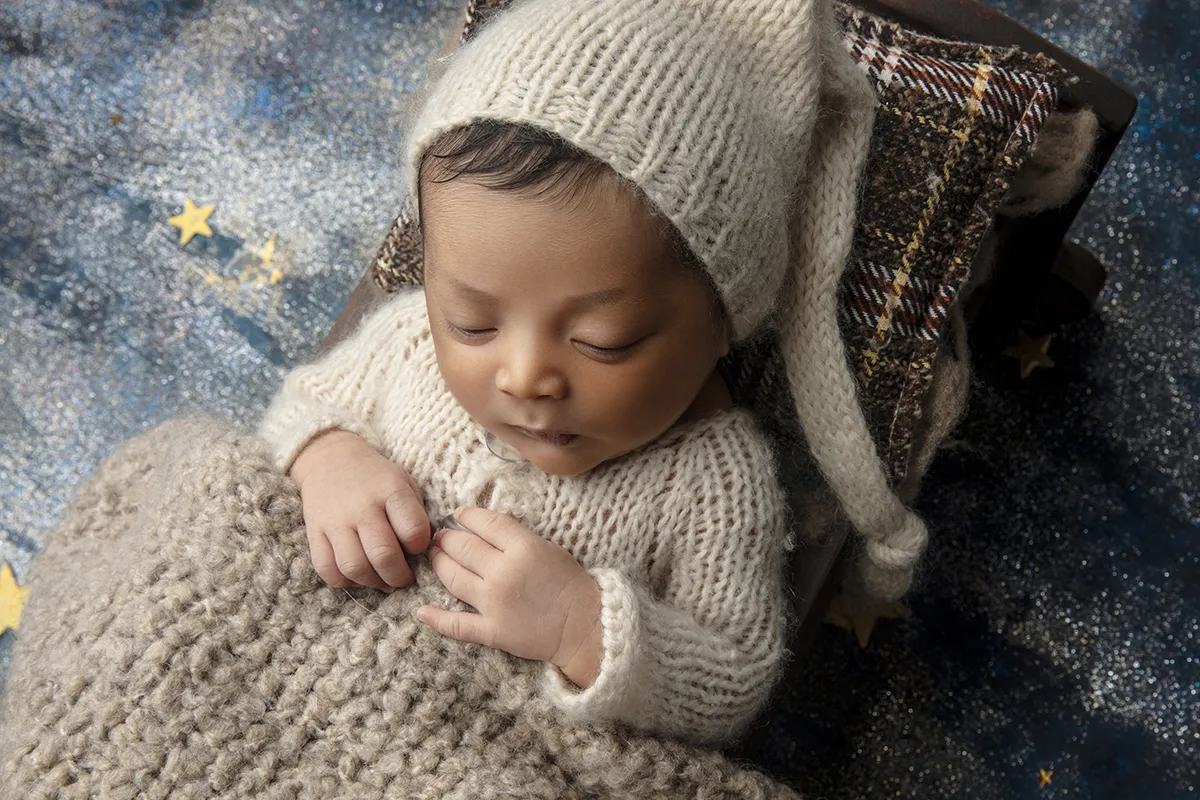 Sleeping newborn baby portrait photographed during a Photo Hive Auckland newborn session